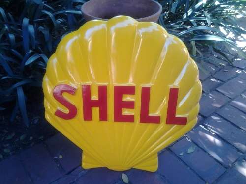 shell motor oil embossed clam sign